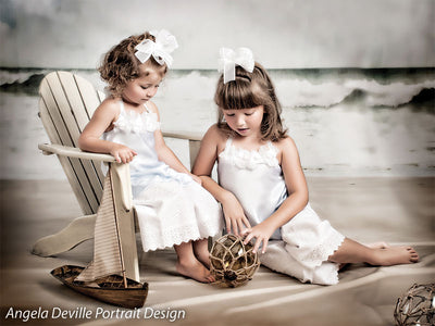 Backdrop with hints of a soft beach storm and rolling ocean textures.