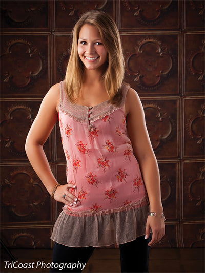Gritty copper-hued tile background ideal for boutique portraiture.