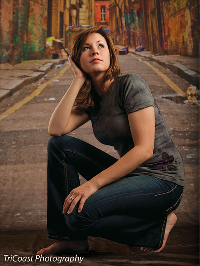 Backdrop showing alley with bins, puddles, and textured grime.
