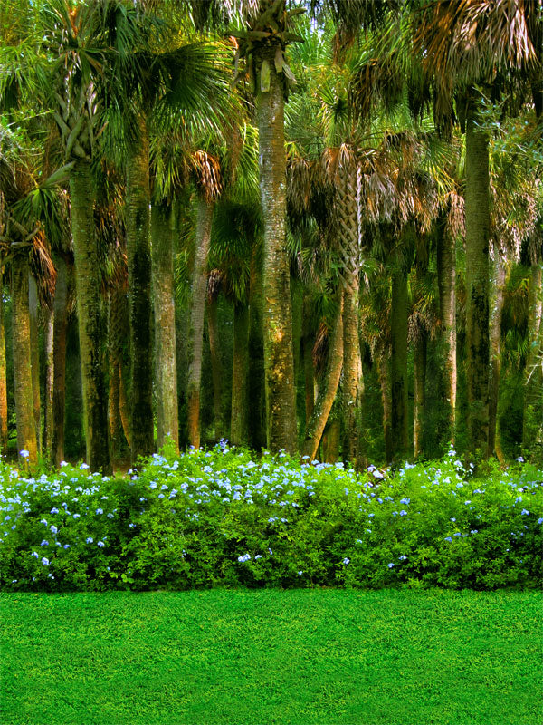 A lush tropical palm forest photography backdrop featuring tall palms, green foliage, and delicate floral accents—ideal for beach, nature, and travel-themed photoshoots.