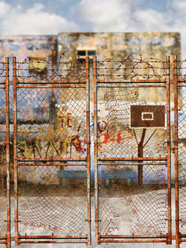 Urban Basketball Court with Rusted Fence Photography Backdrop - Rusted fence with barbed wire in front of graffitied urban wall and a basketball hoop, ideal for urban-themed photoshoots.