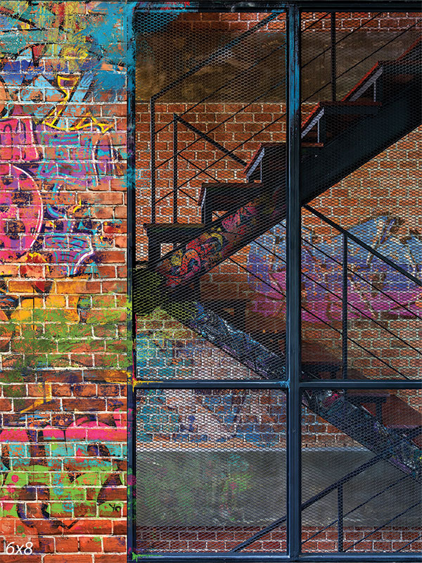 Urban Graffiti Stairwell Photography Backdrop - Photography backdrop featuring a brick wall with colorful graffiti and a metal staircase, encapsulating an urban street art vibe.