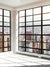 Urban Skyline Loft Photography Backdrop - Photography backdrop of a modern loft with floor-to-ceiling windows overlooking a panoramic city skyline for a contemporary urban look.