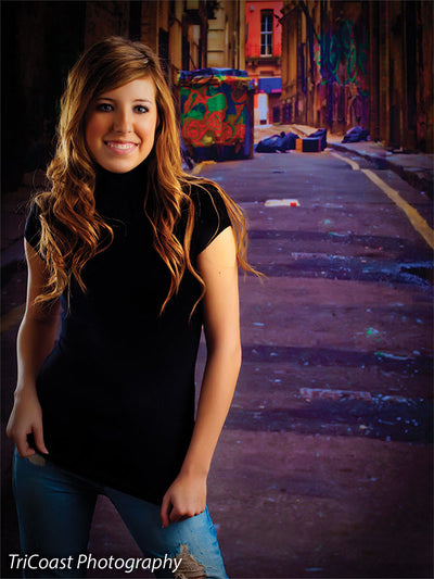Backdrop depicting authentic city alley with artistic grit.