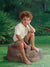 A vibrant, nature-inspired photography backdrop with soft, even lighting and an outdoor setting feel.