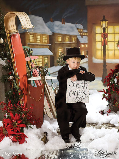 Lamplight casting holiday glow across snow in vintage village setting.