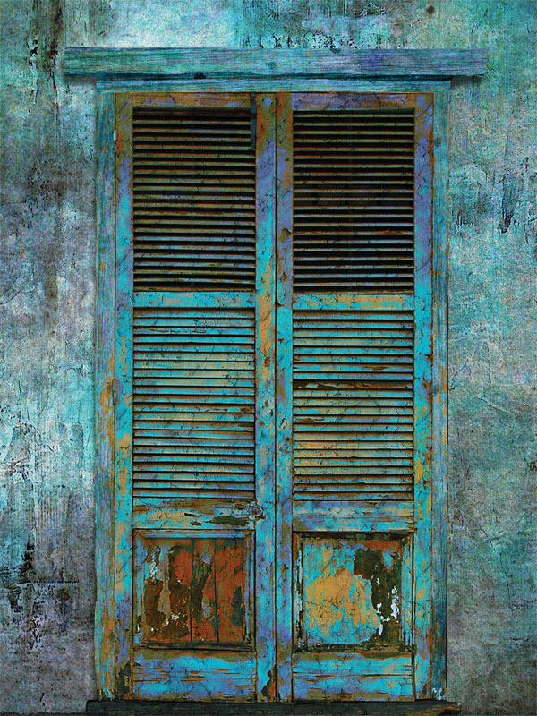 A rustic photography backdrop featuring a distressed blue shutter door set against a weathered wall, perfect for vintage and urban themes.