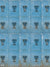 Vintage Blue Metal Locker Photography Backdrop - Photography backdrop featuring distressed blue metal lockers with heart-shaped latches, perfect for a vintage industrial look.