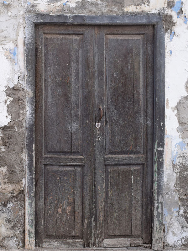 Vintage Distressed Wooden Door Photography Backdrop - Rustic distressed wooden door photography backdrop with textured weathered wall, perfect for vintage-themed photoshoots.