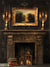 Vintage Elegance Fireplace Photography Backdrop - Photography backdrop featuring an ornate vintage fireplace setting with intricate carvings, a gilded painting, and warm candlelight.