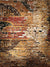 Vintage Urban Graffiti Brick Wall Photography Backdrop - Photography backdrop featuring a rustic brick wall with faded graffiti in muted reds, yellows, and dark tones, perfect for urban-themed photoshoots.