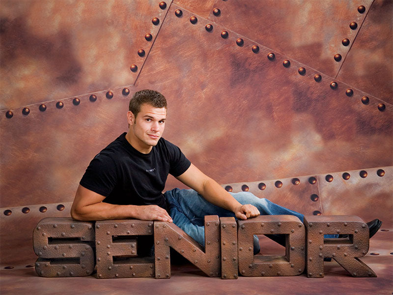 Layered vintage-style steel backdrop with patina and warm gradient rusting.