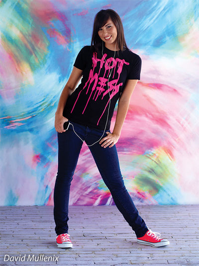 A flowing blend of vibrant blue, pink, and yellow with painterly style.
