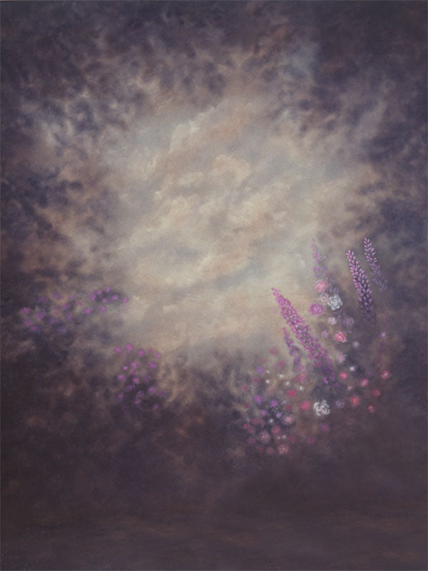 Dreamy floral backdrop with purple and pink wildflowers in a misty cloud setting.