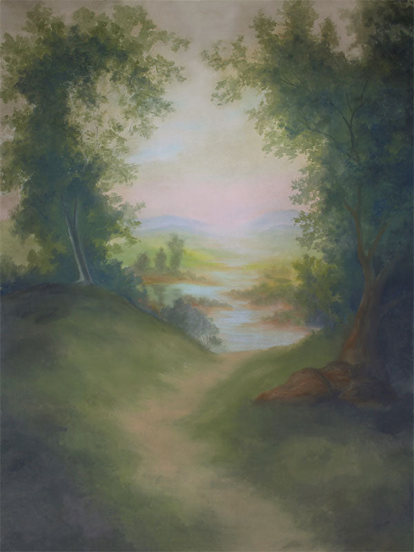 Printed photography backdrop with soft landscape of trees, hills, and sunrise tones, ideal for nature-themed portraits.