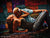 Dramatic couple’s portrait captured against a vibrant textured backdrop with overlapping shapes in red, blue, green, and gold.