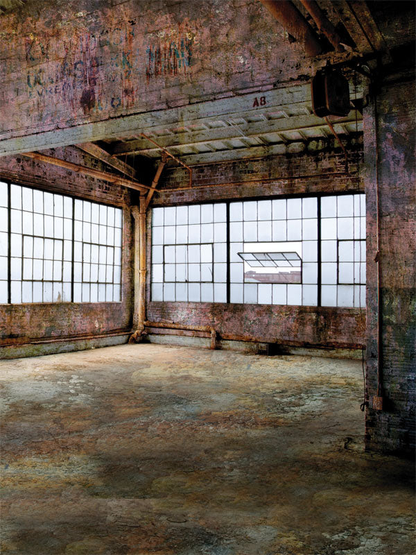 Industrial factory photography backdrop featuring gridded windows and rustic textures, ideal for portrait and senior photo sessions.